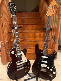 Squier Classic Vibe Stratocaster (Mint) and Epiphone Les Paul Traditional Pro