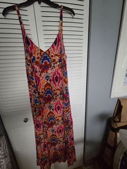 Lovely 100%rayon, soft, flowey, size L. Excellent condition,  worn once. Pretty vibrant colors