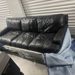 Genuine soft leather black sofa -very comfortable . 7 feet long $495