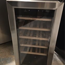 STAINLESS STEEL FREESTANDING WINE COOLER.....18 BOTTLES....$ 150