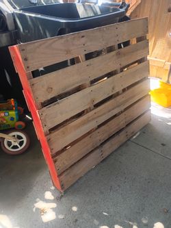 Heavy duty red wood pallet