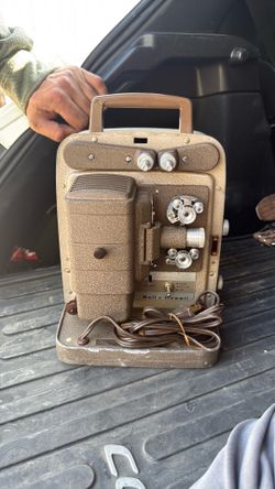 bell and howell 253 ax film projector with films
