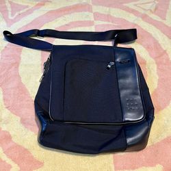 Tumi nylon and leather Crossbody Messenger Bag like new. unisex 