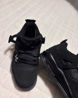 Black cats Jordan 4s men and women