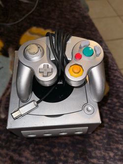 Nintendo Gamecube (Silver) with memory card and controller.