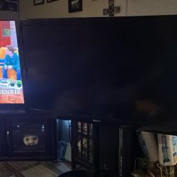 50” Sanyo Tv With Stand  & 3 Shelves 
