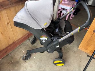 Gray Doona Baby Stroller Carseat