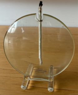 Glass oil candle lamp on stand, 4” diameterX4 1/2” tall.