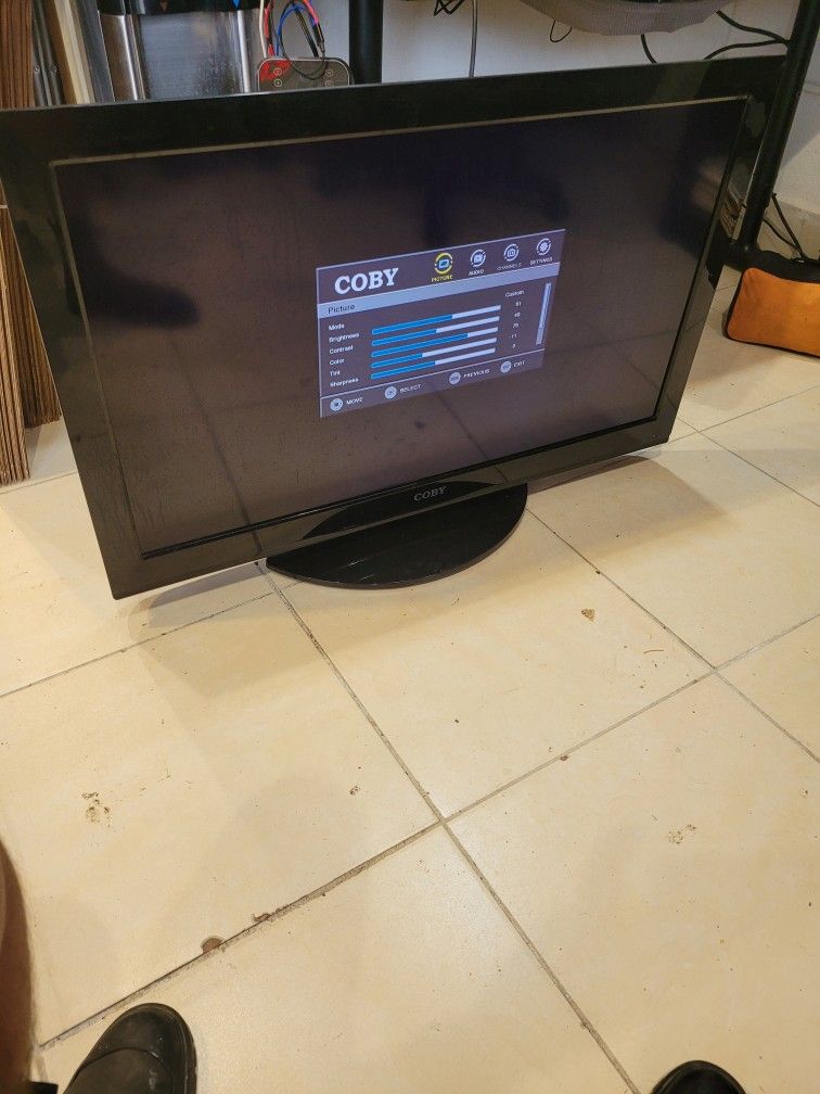 Coby Tv 42" Television. Not smart tv comes with control remote