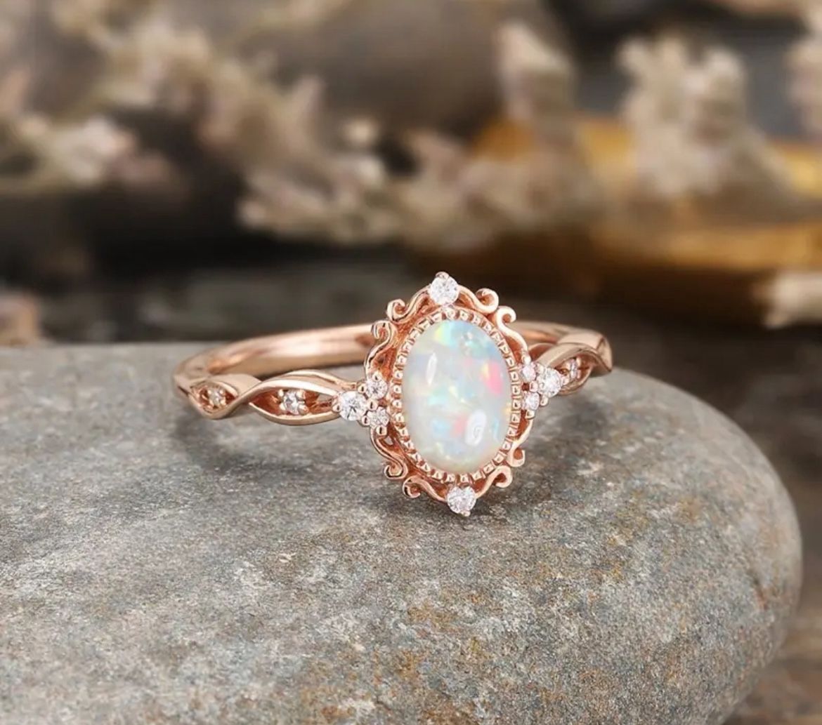 Elegant rose toned alloy ring with synthetic opal