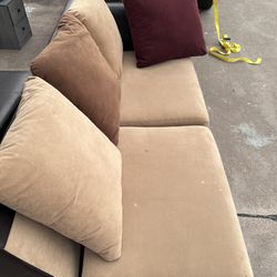Leather And Microfiber Sectional And Ottoman 