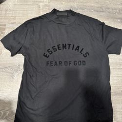 Selling authentic Fear of God Essentials Shirt in black, size Medium 