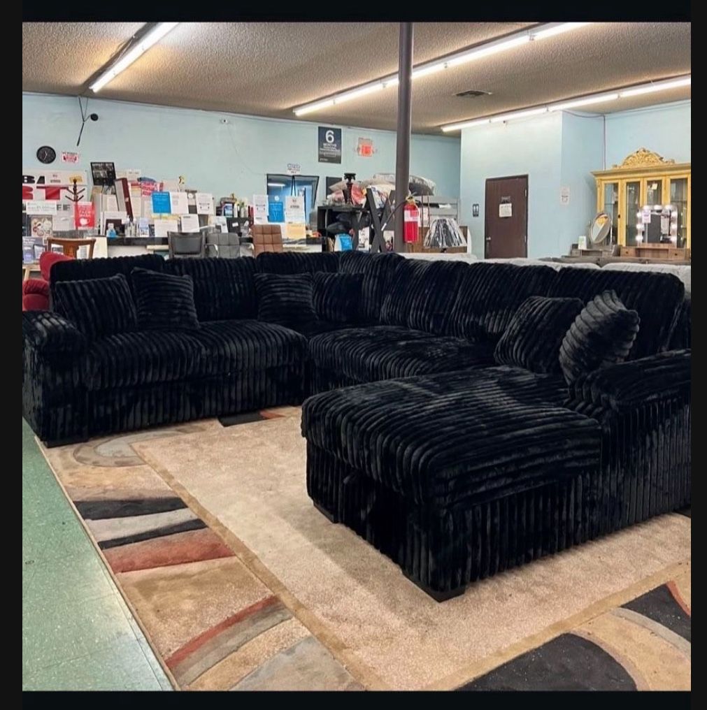 Brand New Super Plush Black Corduroy Pullout Sectional 