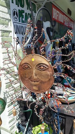 Cool large metal Sun face embellished with beads and Chimes wall art