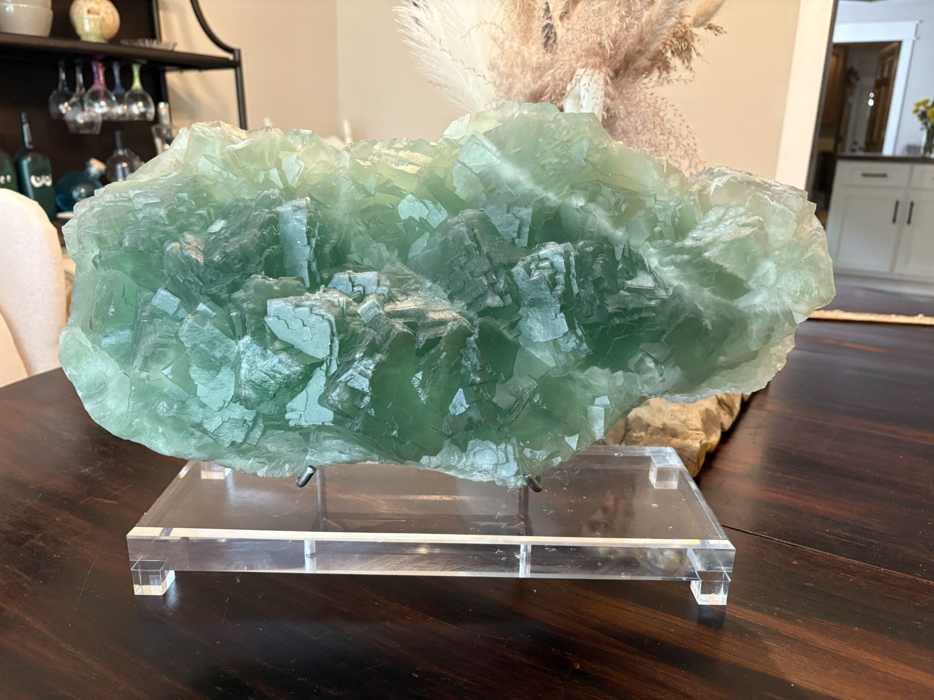 Large and heavy raw cubic fluorite with stand