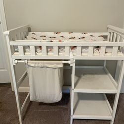 Baby changing table with pads