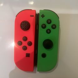 Green And Pink Nintendo Switch Joycons 