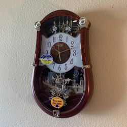 Rhythm Musical Clock