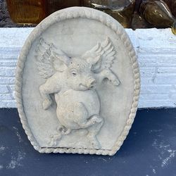 Concrete pig decor