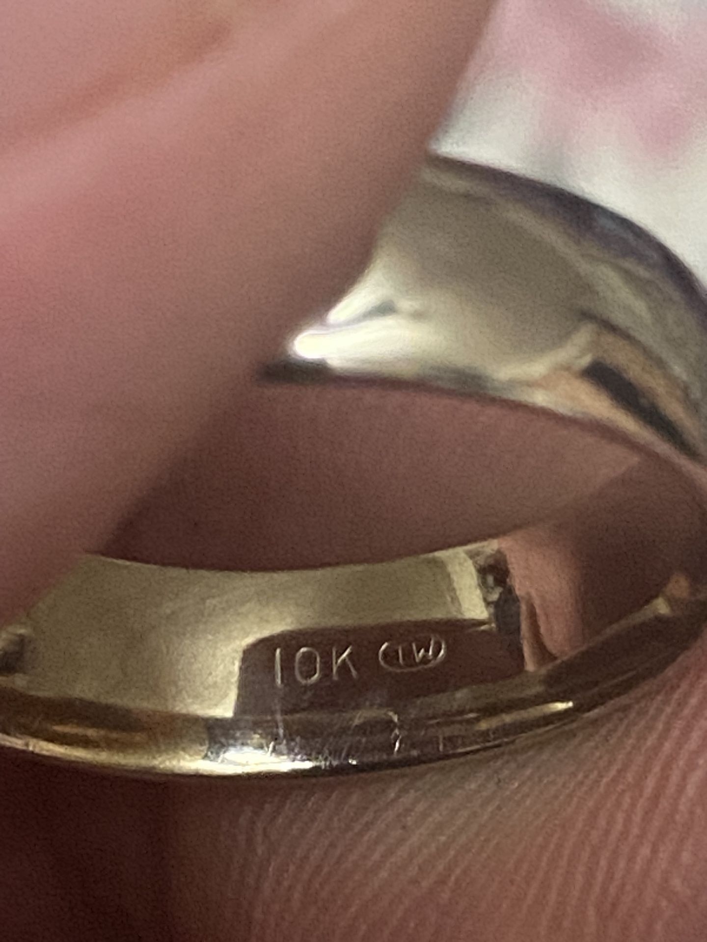 Men's wedding ring in 10 karat white gold, I ask for $340 the price is firm.