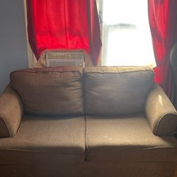 Twin brown wood couches -one big, one small