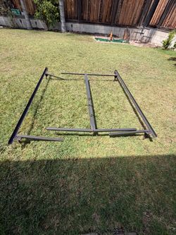 Sturdy Queen or King Metal Bed Frame with Center Support – Good Condition