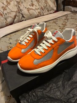 Orange Prada sneakers
