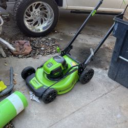 Greenworks lawn mower with 1 battery and (3 batterys for ryoby  edger) And ryoby edger