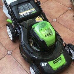“ NEW “  80 VOLT  Greenworks 21” Steel Deck Self Propelled Mower  Plus 80 Volt 16 Inch Chainsaw  With 5 AH Battery And Charger Lawn Mower