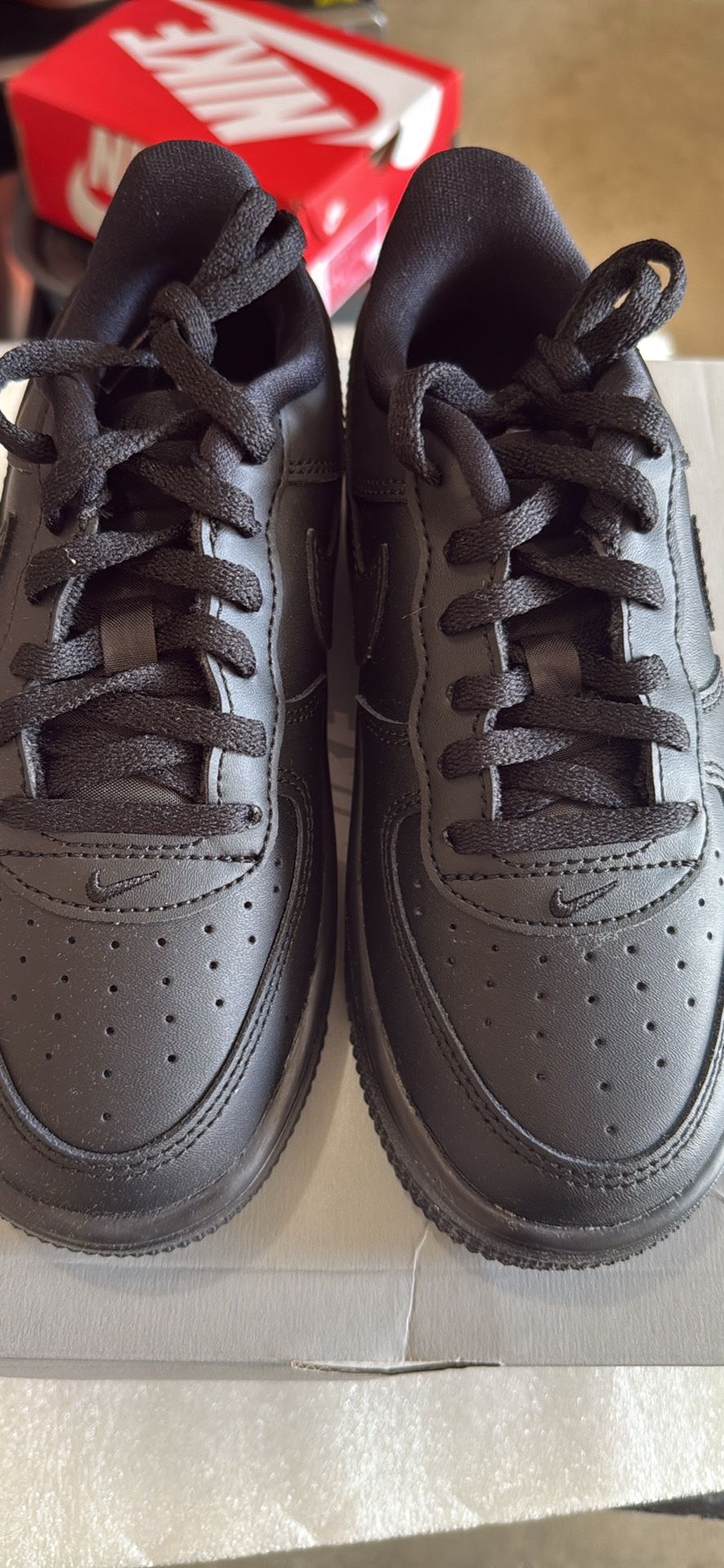 Brand New Air Force Low Top Black Size 1Y Asking price is $50.00 Pick up in Powder Springs Ga 30127