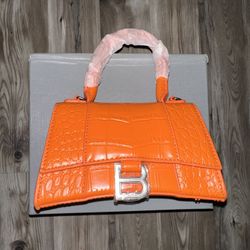 balenciaga orange purse