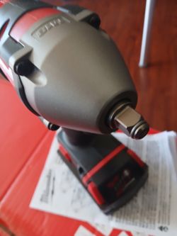 M18 Lithium-long cordless 3/8 impact wrench new And battery 4 ah new