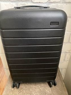 Away black carry on suitcase