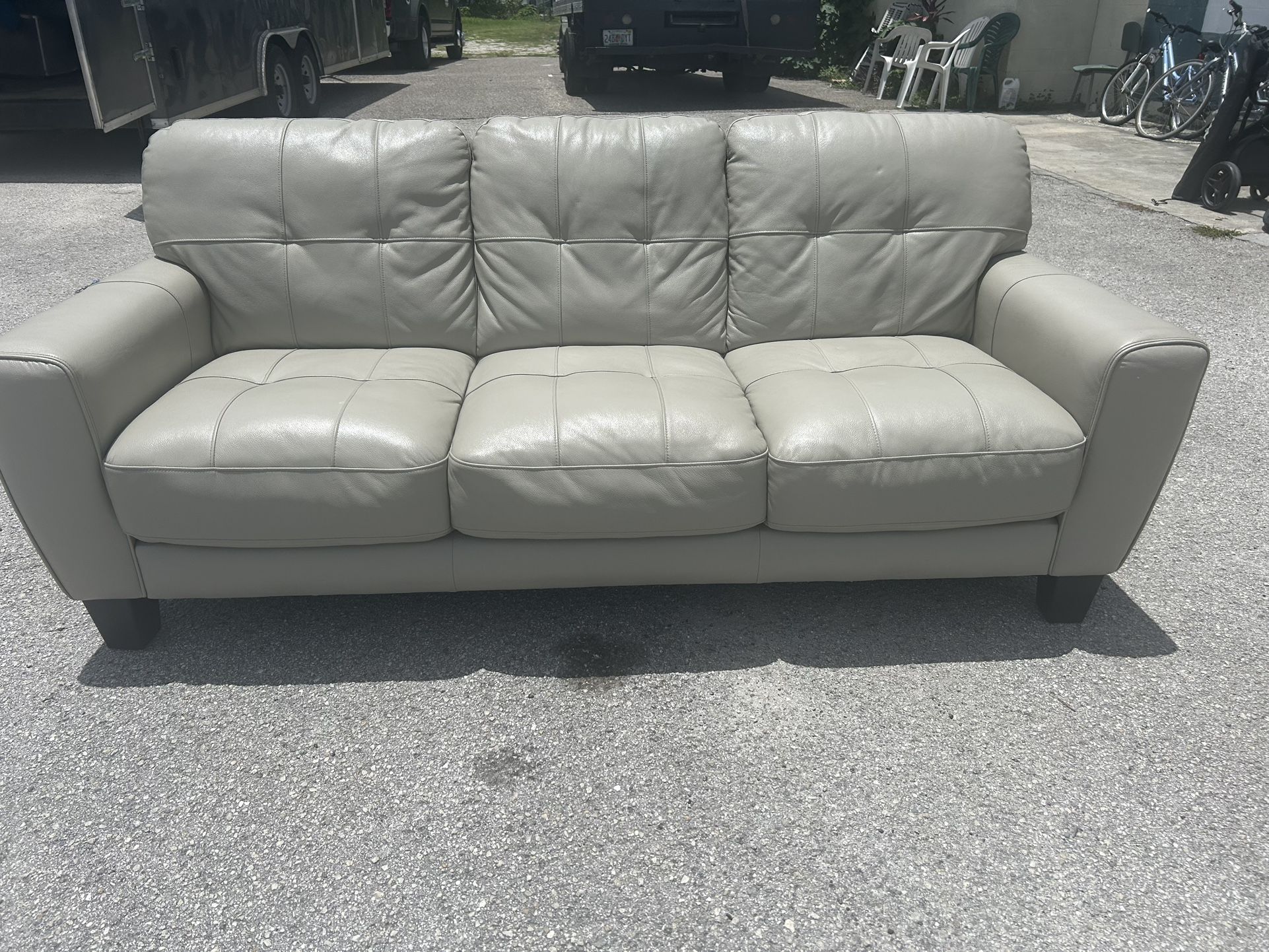 Taupe leather couch sofa