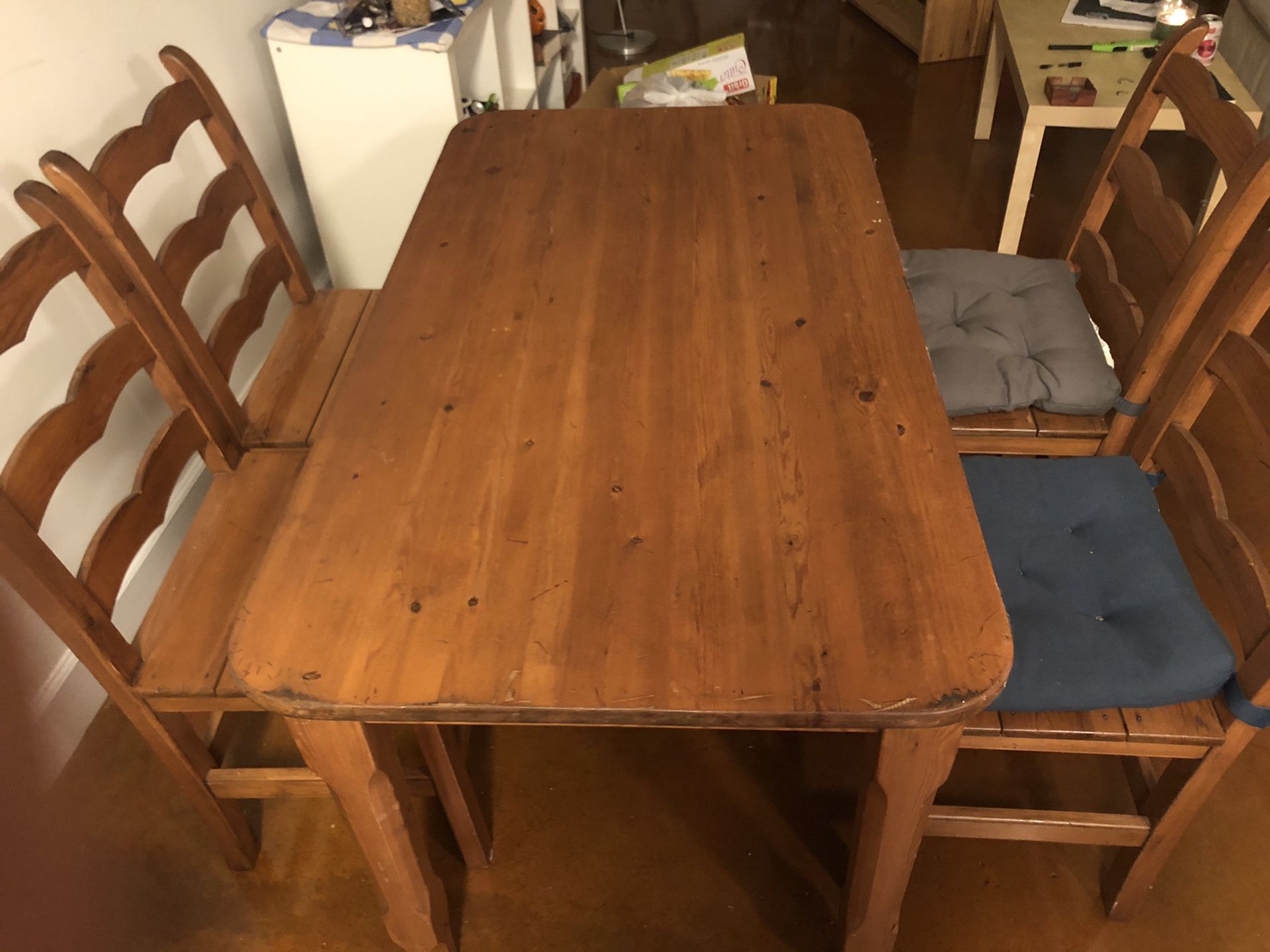 Wooden dining table and chairs