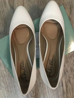 Abella White Pumps