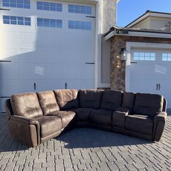 Sectional couch with electric recliners