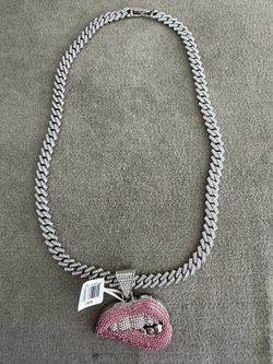 New. Never worn. Iced Out Cuban Link Chain with Lip Pendant $60obo