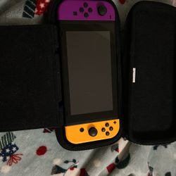 regular old nintendo switch with charger and case 