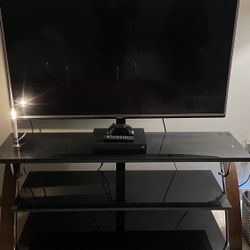 LG 55” TV w/ Mounted Entertainment Center
