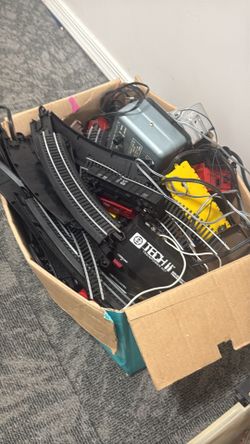 HO scale and O scale train tracks, train cars, transformers