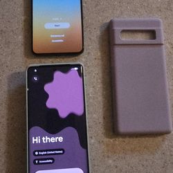 Two phones. Galaxy 6 pro with extra case and Samsung S22+ no case.