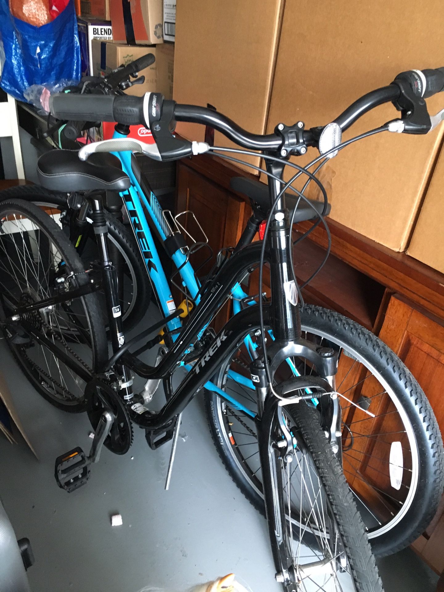 Pair of trek bikes and bike trailer