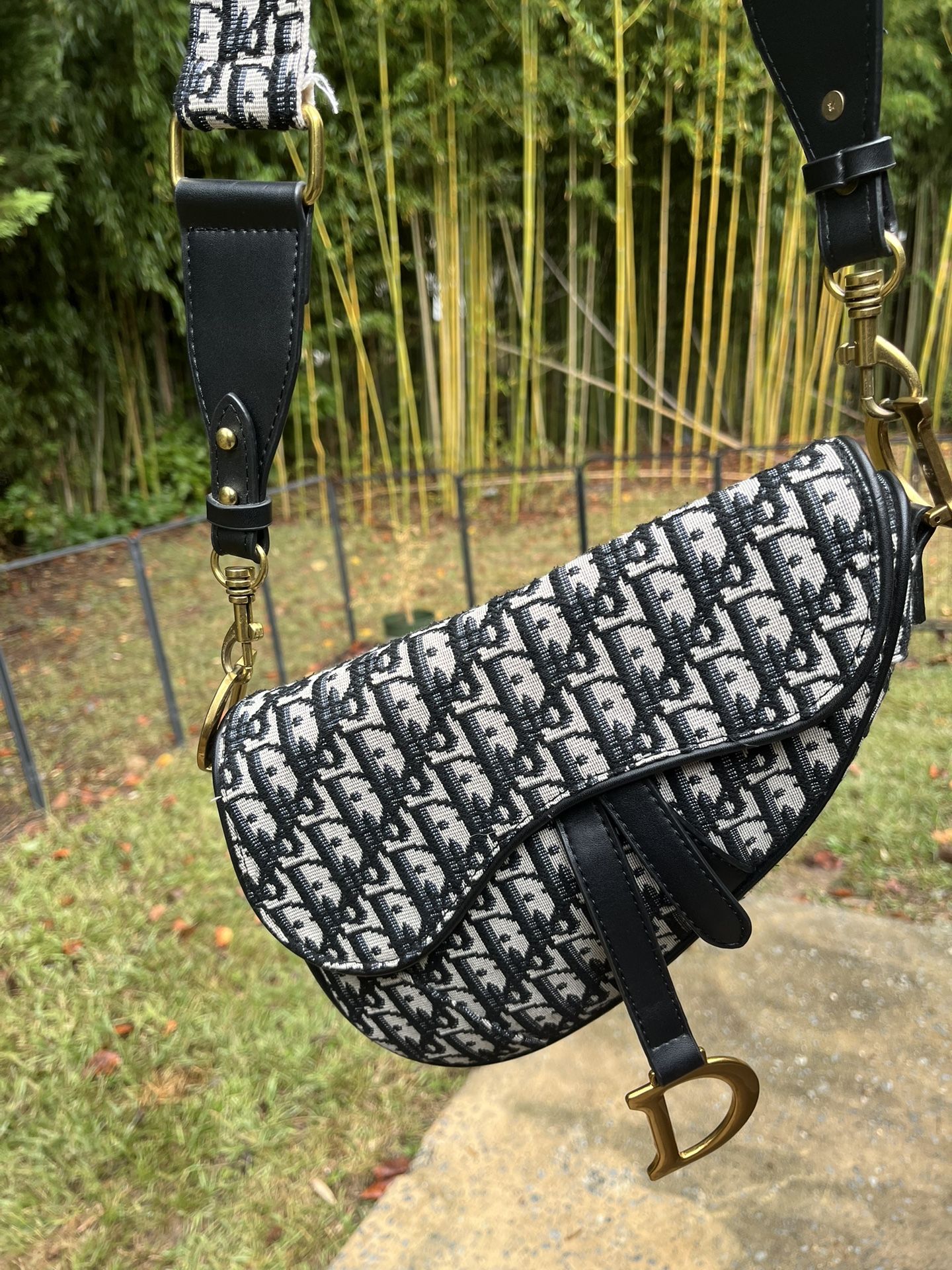 Oblique monogram saddle bag