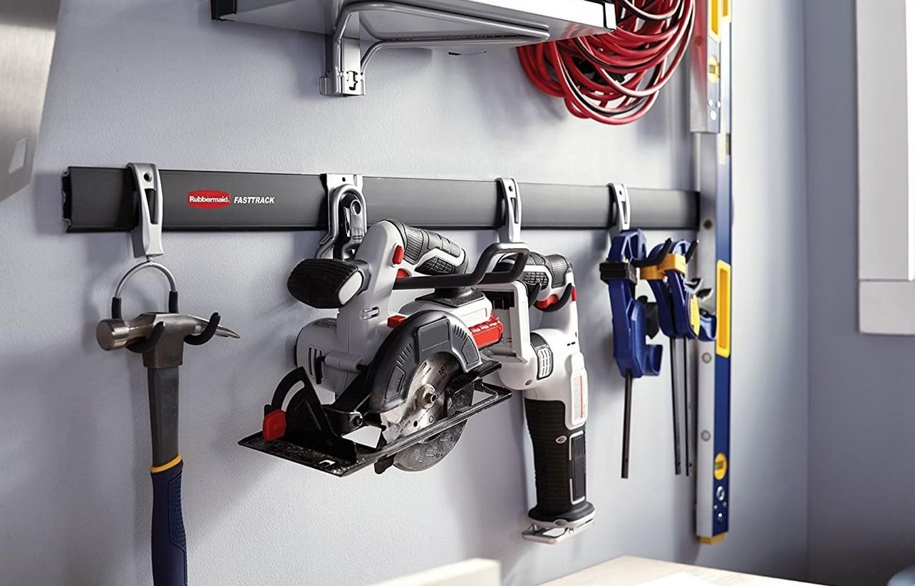 Assortment Of Rubbermaid Fasttracks, Hooks, And Shelves