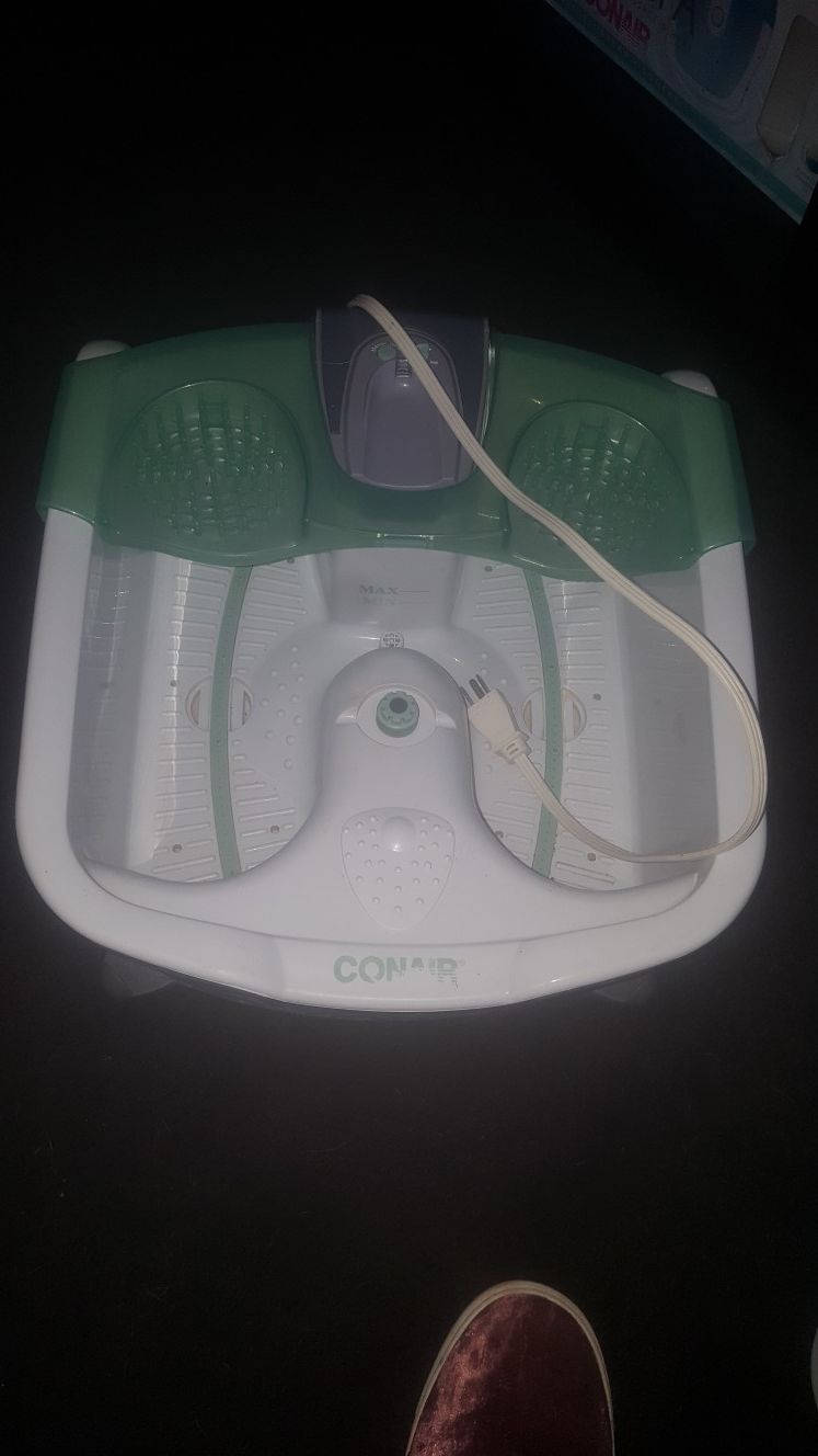 Remote-controlled Conair heated foot spa with attachments