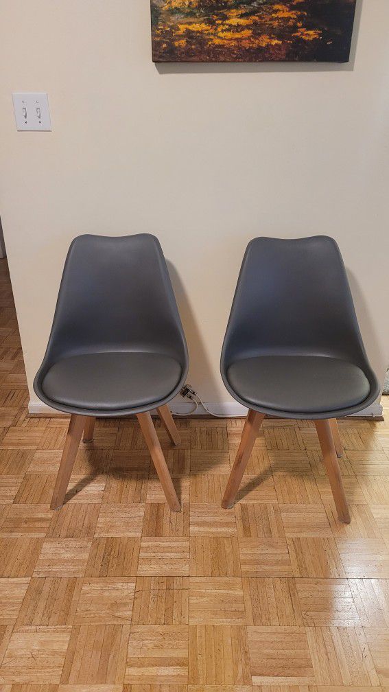 Two Gray Eames Style Mid-century Modern Chairs