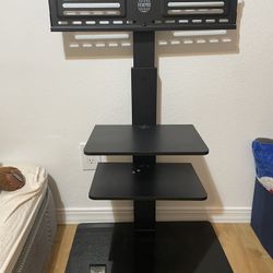 Heavy Glass Base and 43” TV Onn 