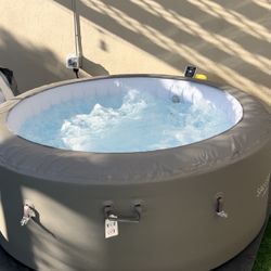 Used inflatable hot tube for sale.