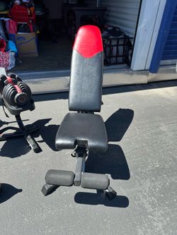Bowflex adjustable + misc gym equipment